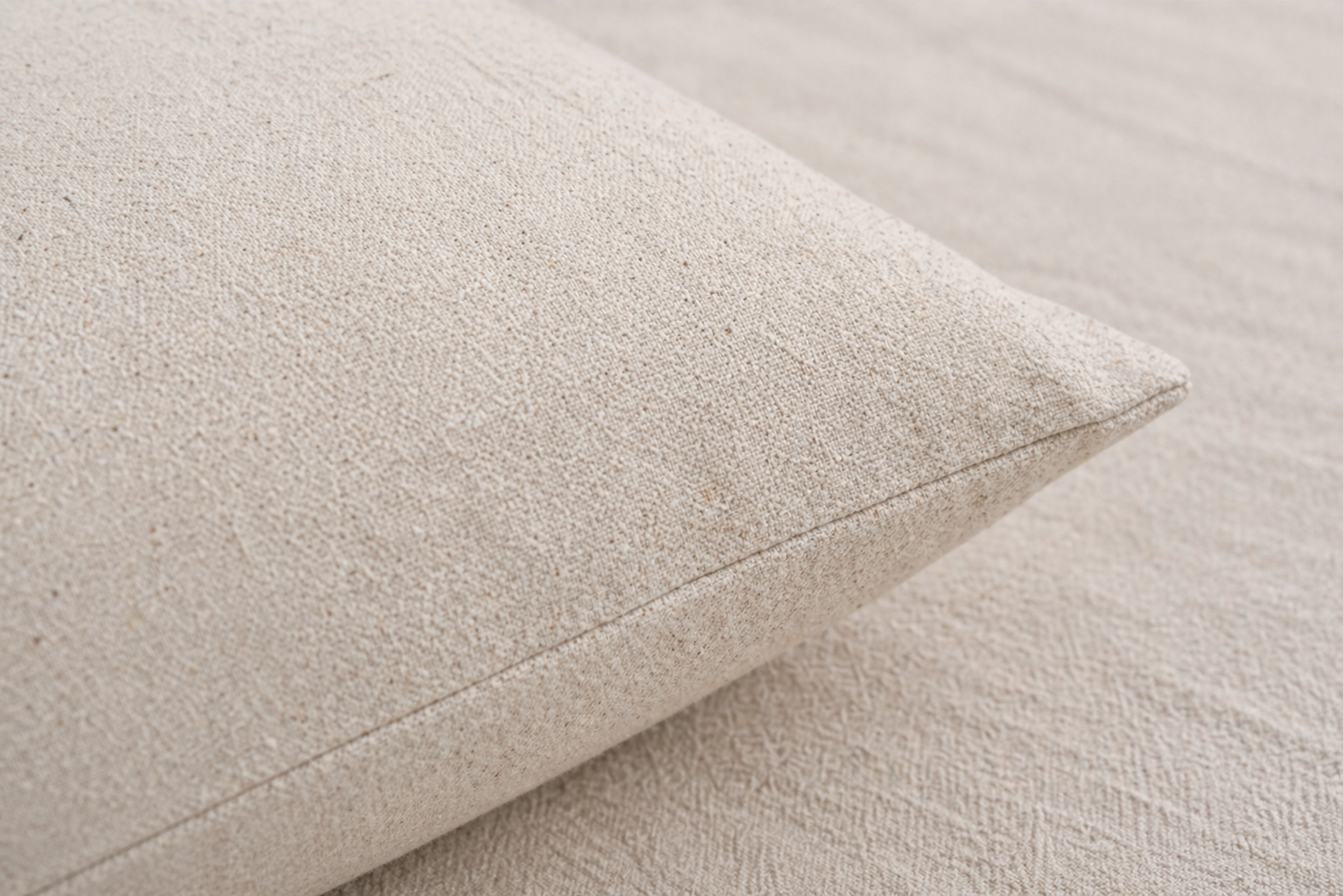 Drokona organic cotton pillow styled on bed