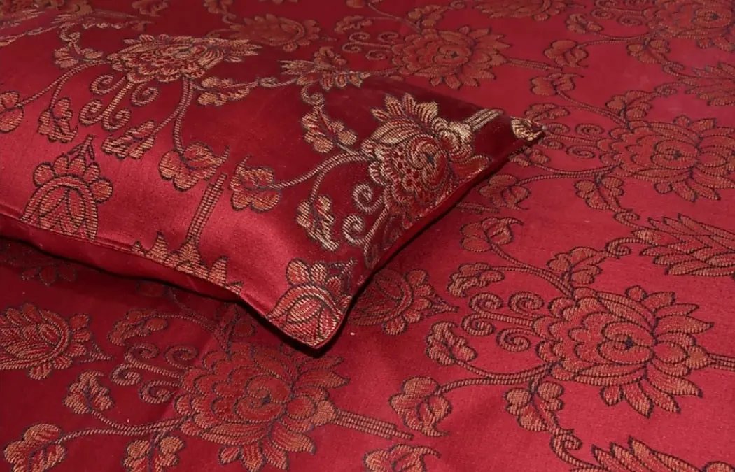 Drokona Crimson Dream bedsheet on bed styled
